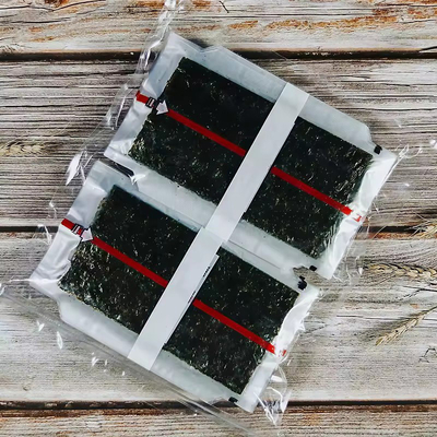 Triangle Onigiri Nori with Steamed Seaweed Triangle Laver Alga in Plastic Packaging